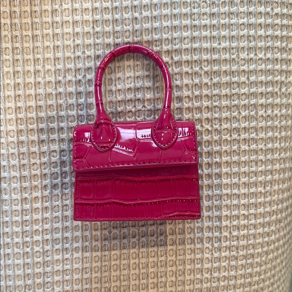 Elegant Pink Crocodile-Embossed Handbag